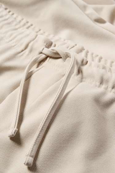 Bărbați - Pantaloni de trening - structurați - bej deschis