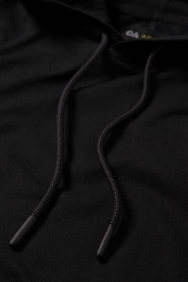 Heren - Oversized sporthoodie - zwart
