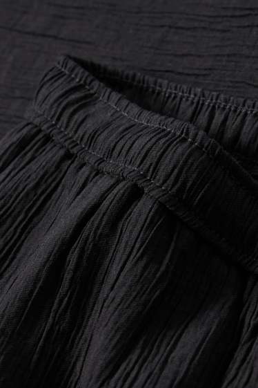 Donna - Pantaloni - vita media - gamba ampia - nero