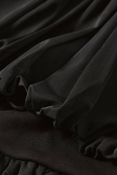 Dona - Faldilla - negre