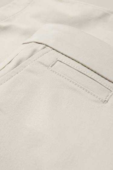 Femei - Chino - talie medie - tapered fit - bej