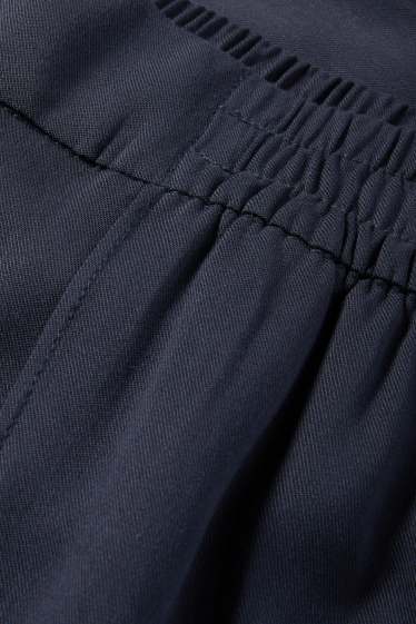 Dona - Pantalons de tela - high waist - tapered fit - blau fosc