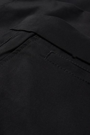 Femmes - Chino - mid waist - tapered fit - noir