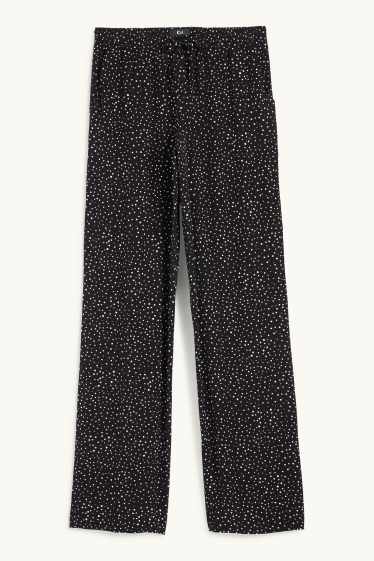 Femmes - Pantalon en toile - high waist - jambe évasée - à pois - noir