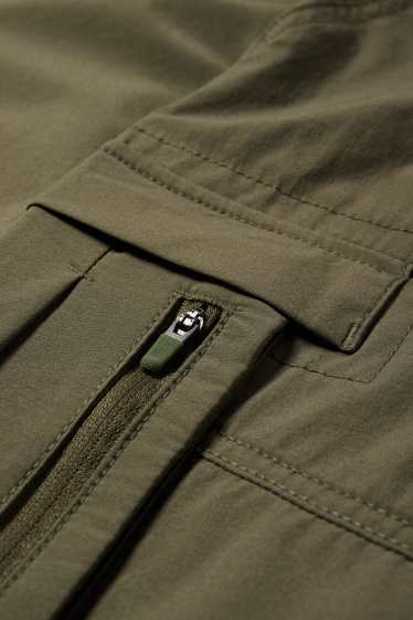 Hommes - Pantalon cargo de sport - relaxed fit - vert foncé