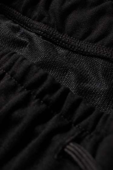 Uomo - Pantaloni sportivi tecnici - nero