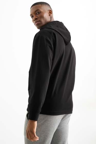 Heren - Oversized sporthoodie - zwart