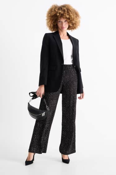 Femmes - Pantalon en toile - high waist - jambe évasée - à pois - noir