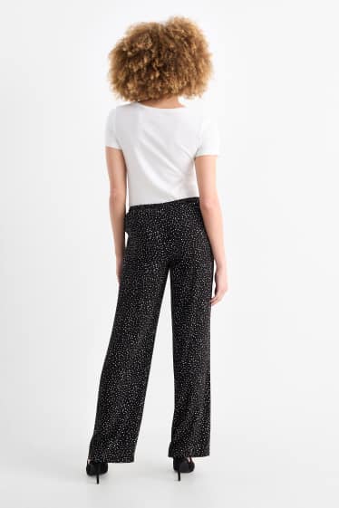 Femmes - Pantalon en toile - high waist - jambe évasée - à pois - noir