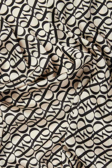 Dames - Sjaaltje - met patroon - zwart / beige