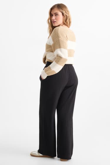 Donna - Pantaloni - vita media - gamba ampia - nero