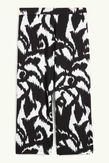 Women - Jersey trousers - high waist - wide leg - patterned - black / white