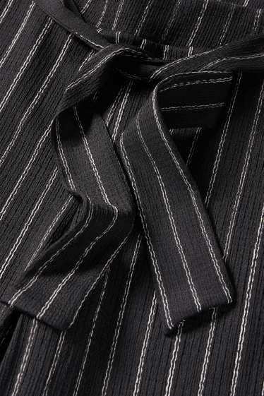 Women - Jersey trousers - mid-rise waist - wide leg - striped - textures - black