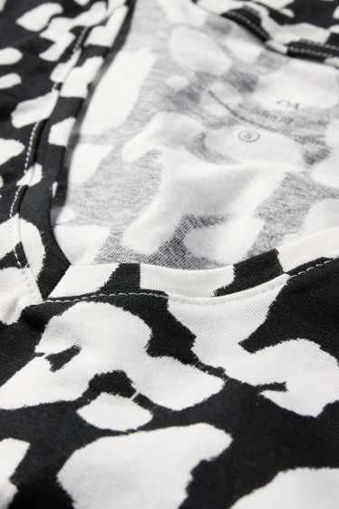 Dames - T-shirt met V-hals - luipaardprint - zwart / wit