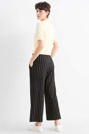 Women - Jersey trousers - mid-rise waist - wide leg - striped - textures - black