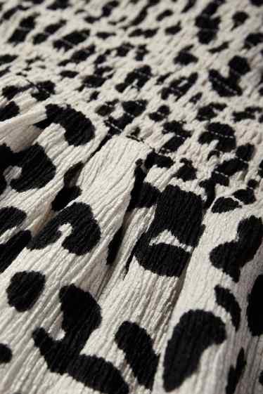 Dona - Vestit fit & flare - estampat de lleopard - estructurat - de punt de niu d'abella - negre/beix