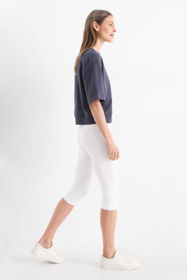 Dames - Set van 2 - basic capri-legging - zwart / wit