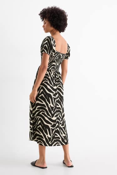 Dona - Vestit fit & flare - estampat - punt de niu d'abella - negre/beix
