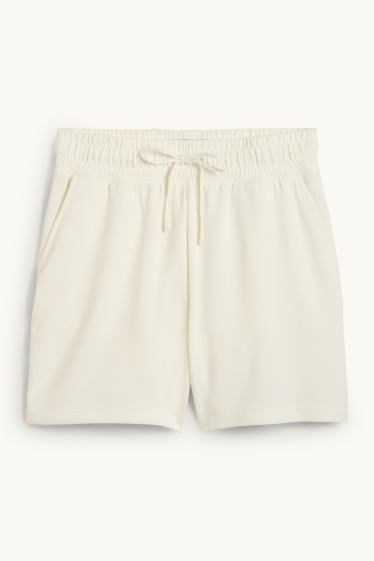 Dona - Pantalons curts tècnics - beix clar