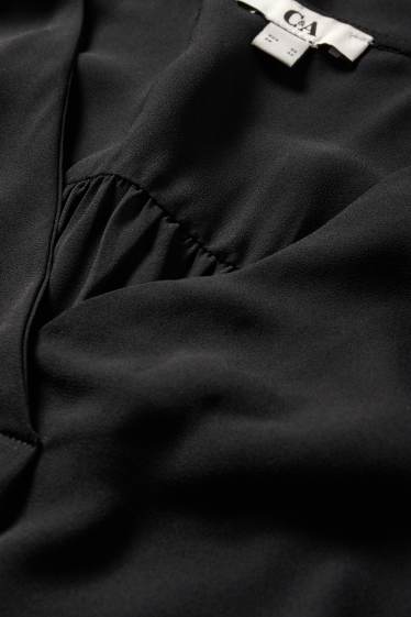 Women - V-neck blouse - black