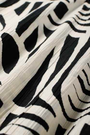 Dames - Fit & flare-jurk - met patroon - zwart / beige