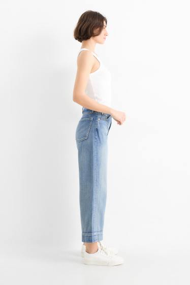 Dames - Korte wide leg jeans met riem - mid waist - jeanslichtblauw