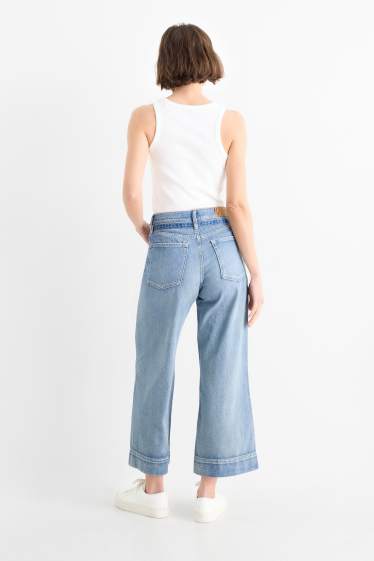Dames - Korte wide leg jeans met riem - mid waist - jeanslichtblauw