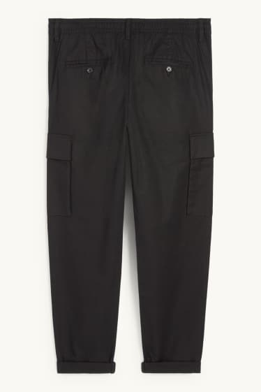 Uomo - Pantaloni cargo - tapered fit - nero