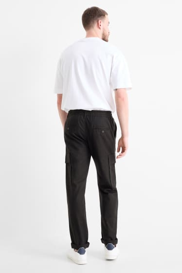 Uomo - Pantaloni cargo - tapered fit - nero