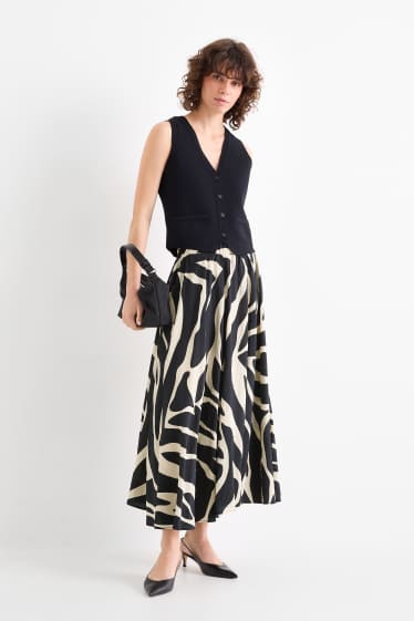 Dona - Faldilla - estampada - negre/beix