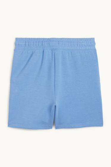 Dona - Pantalons curts tècnics - blau clar