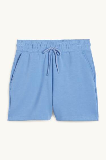 Dona - Pantalons curts tècnics - blau clar