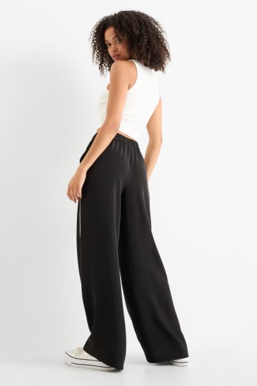 Dámské - Plátěné kalhoty - mid waist - wide leg - černá