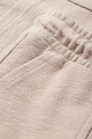 Kinderen: jongens - Joggingbroek - beige