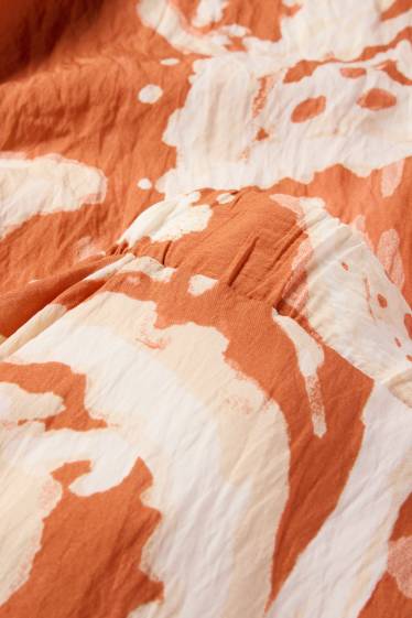 Dames - Rok - met patroon - donker oranje