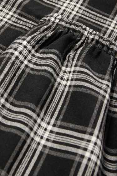 Kinder Mädchen - Stoffhose - kariert - schwarz