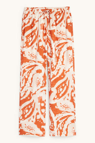 Dona - Pantalons - mid waist - palazzo - estampat - taronja fosc