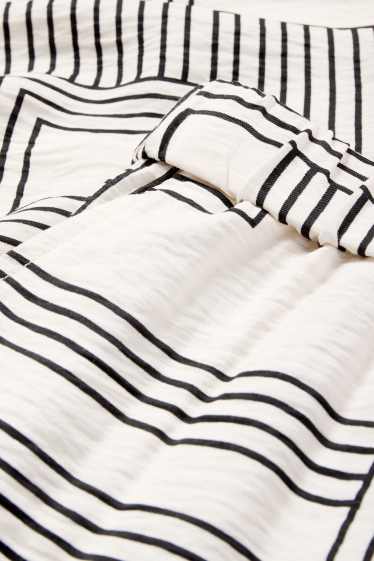 Femmes - Pantalon en toile - high waist - wide leg - à motif - blanc / noir