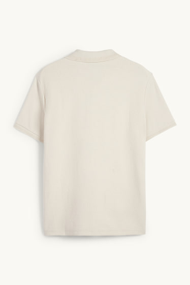 Hommes - Polo en maille - regular fit - finition texturée - beige