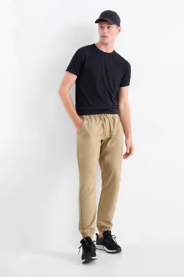 Herren - Funktions-Jogginghose - beige