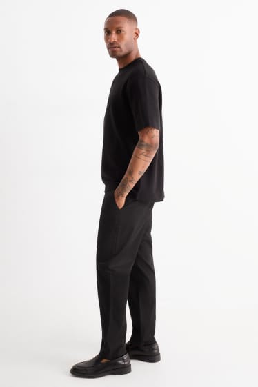 Pánské - Kalhoty chino - tapered fit - černá