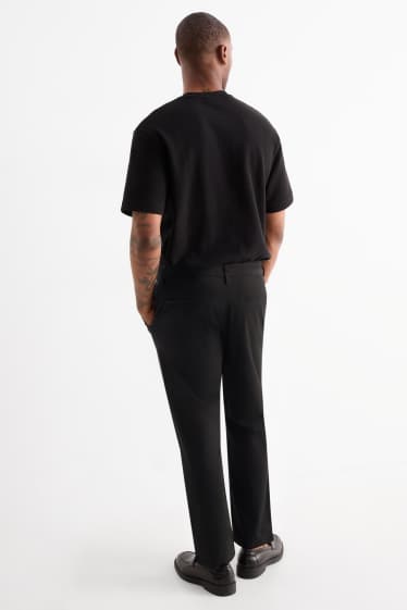Pánské - Kalhoty chino - tapered fit - černá