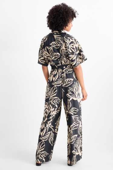 Dames - Jumpsuit - gebloemd - zwart / beige