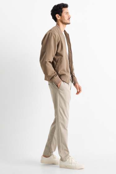 Pánské - Kalhoty chino - tapered fit - s úzkými proužky - béžová