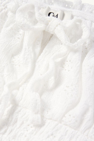 Dames - Korte top - broderie Anglaise - gesmokt - wit