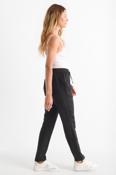Femmes - Pantalon en toile - mid waist - tapered fit - noir