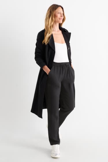 Femmes - Pantalon en toile - mid waist - tapered fit - noir