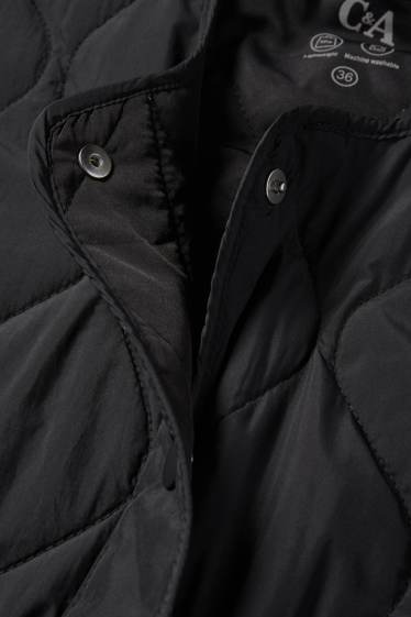 Women - Quilted gilet - black