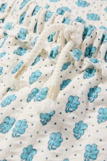 Kinder Mädchen - Jersey-Hose - geblümt - strukturiert - blau  / cremefarben