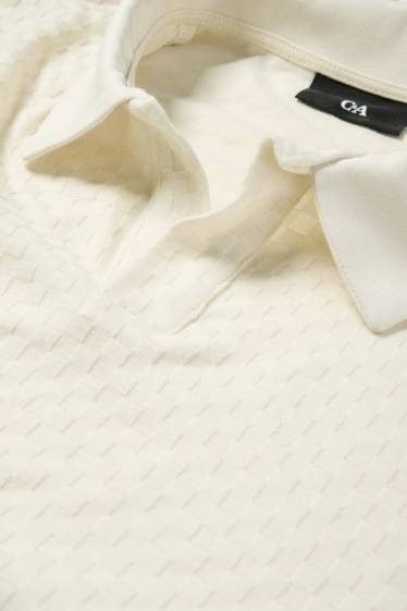 Hommes - Polo - regular fit - finition texturée - blanc crème